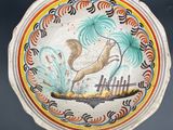 a decorative plate with a picture of a dog on it
