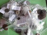 a pile of coins in a plastic bag on a table
