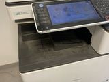 a printer that is sitting on top of a desk