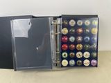 a binder that has a bunch of buttons in it
