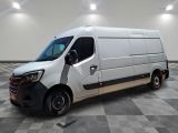 la photo d'une camionnette blanche garée dans une pièce
