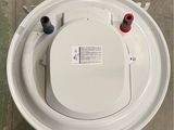 an overhead view of a toilet with the lid up