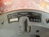 a close up of a garmin on the side of a dishwasher