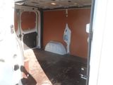 a white van that is parked inside of a building