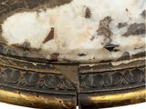 an image of a close up of a table with a marble top