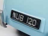 a close up of a blue car with a number plate on it