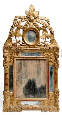 a picture of a gold frame with a mirror in it