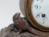 a clock that is sitting on top of a table