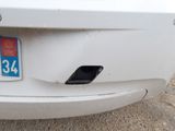 a picture of a white car with a license plate on it