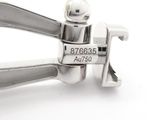 a close up of a pair of scissors on a white surface