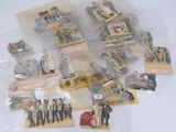 a lot of miniature figurines of people in plastic bags