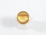 une image représentant une bague en or sertie d'une citrine facettée