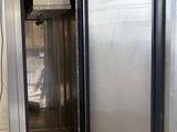 an image of a stainless steel refrigerator in a kitchen