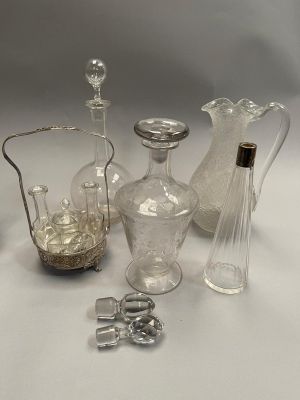 a lot of glass items that are sitting on a table