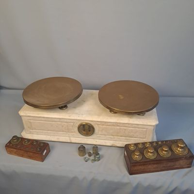 two plates and a wooden box on a table