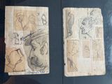 sketches of a man ' s head and a woman ' s face in a book