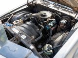 a car engine with the hood open and the hood up