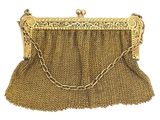 a gold chain purse with a chain around it