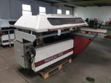 an image of a large machine that is sitting in a warehouse