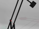 the black lamp is on a white surface with a white background