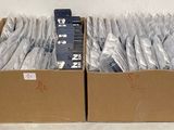 a lot of silverware in a box on a table