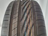 a close up of a tire on a white surface