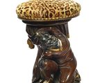 leopard print stool with a pug on it and a leopard print cushion on top