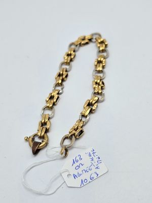 a close up of a chain with a tag attached to it