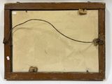 an old wooden frame with a wire in it hanging on a wall