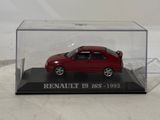 a red toy car in a clear case on a table