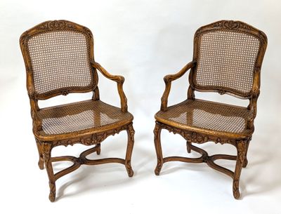 pair of antique cane back chairs with cane back and cane back arms