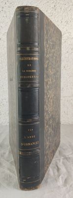 an old book sitting on top of a white table