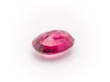 a pink tourmaline gems on a white background