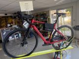 a bike that is sitting on a stand in a shop