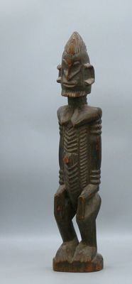 an image of a statue of a man with a fish on his head