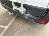 an image of a car with a rack attached to the back of it