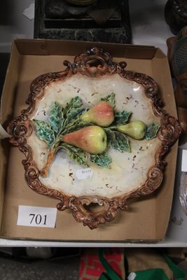 a plate with fruit on it sitting in a box