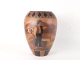 a vase with a picture of a man and a dog on it