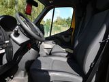 a view of the inside of a truck with the steering wheel down