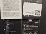 a picture of the back of a black box with a white label on it