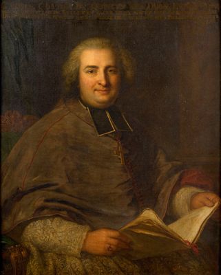 portrait d'un homme tenant un livre sur ses genoux