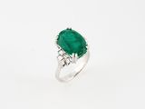 an oval emerald and diamond ring