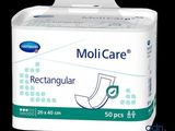 un gros plan d'une boîte de lingettes hygiéniques sur fond noir