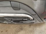 a close up of the front bumper of a car