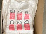 a cardboard box that has a bunch of items inside of it