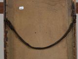 painting on a wooden easel with a rope around the frame