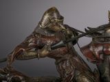 a statue of a man on a horse with a sword