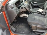 the interior of a car with the door open showing the driver ' s seat area