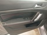 the interior of a car with the door open showing the inside of it