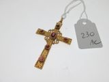 a close up of a cross with a price tag attached to it